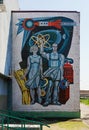 Ust-Labinsk, Russia - April 25, 2019: Soviet modernism era historic mosaic on work, industry, space, science themes