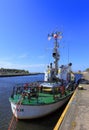 Ustka, Pomerania, Poland - Ustka seaport peers and ships and the Royalty Free Stock Photo