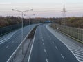 Usually full of car, now empty highway A4 due to the coronavirus pandemic. On signposts names of town and directions in Poland.
