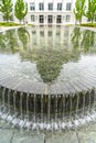 Utah State Capital Building reflected at the clear water of a circular pool