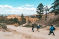 Hikers make their way down the steep switchbacks on the Queens Garden and Navajo Loop trail in Bryce