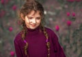 ÃÂ¡ute girl in a crimson turtleneck and with two pigtails