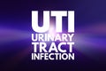 UTI - Urinary Tract Infection acronym, medical concept background Royalty Free Stock Photo