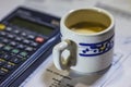 Utility bills, coffee and calculator Royalty Free Stock Photo