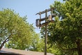 A utility pole with electric wires and two transformers on it. Royalty Free Stock Photo