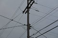 Utility Pole With Large Amount Of Power Lines And Telephone Cables Royalty Free Stock Photo