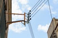 Utility Pole and Power Lines Against Blue Sky Royalty Free Stock Photo