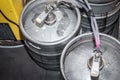 In the utility room, aluminum kegs for storing draft beer and wine are connected by means of hoses. Top view