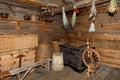 Utility room and interior of an old rural hut with various household tools Royalty Free Stock Photo