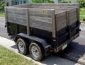 Utility trailer with wooden extension