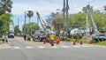 Utility workers with cherry pickers Royalty Free Stock Photo