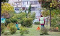 Utility workers are cleaning the territory in a park