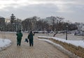 Utility workers on Mikhailovskaya Square in Kiev on a snowy winter day