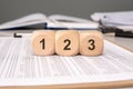 Utilizing Numbered Blocks on a Document Background to Enhance Educational Themes Effectively