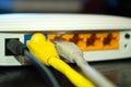 UTP Lan cables plugs in wifi router Royalty Free Stock Photo