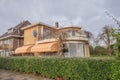 Iconic dutch villa from 1932, with a cloudy sky