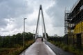 Utrecht, The Netherlands - Contemporary bridge and cycling path during a rainy day