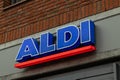 Aldi store front logo close up. Aldi supermarket groceries shop.