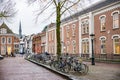 Utrecht, Netherlands - January 08, 2020. Nicolaaskerkhof street with bikes parked by the road Royalty Free Stock Photo