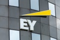 EY (Ernst Young) sign logo. Ernst and Young is an internationally operating service company