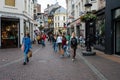 Utrecht, The Netherlands - Young woman walking in the shopping streets of old town