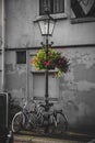 Ornate lantern with geranium flowers, street decoration detail in Utrecht, the Netherlands