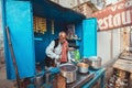 Uttar Pradesh, India - 03-15-2017 - Local man preparing masala chai on the street in Varindavan, Uttar Pradesh, India.