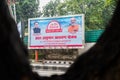 Uttarakhand India. Atal Ayushman Uttarakhand Yojana road side bill board featuring Chief Minister Dhami and Indian Prime Minister