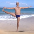 Utthita hasta padangusthasana man beach