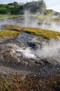 Utu Geysir, a geyser hot water source of the Secret Lagoon in Fludir, Iceland