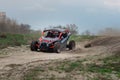 UTV buggy in the action on sand in summer