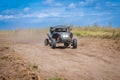 UTV buggy and 4x4 off road vehicle in sandy track. Buggy extreme riding