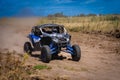 UTV buggy and 4x4 off road vehicle in sandy track. Buggy extreme riding Royalty Free Stock Photo