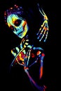 UV body art painting of helloween female skeleton