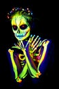 UV body art painting of helloween female skeleton Royalty Free Stock Photo