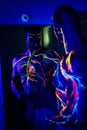 UV patterns body art of the circulatory system on a man`s body. On the chest of a muscular athlete, veins and arteries