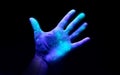 Ultraviolet Light On a Hand Showing Bacteria Growth