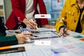 UX developer and ui designer brainstorming about mobile app interface wireframe design with customer breif and color code, User Royalty Free Stock Photo