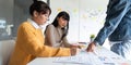 ux developer and ui designer use augmented reality brainstorming about mobile app interface wireframe design on desk at Royalty Free Stock Photo