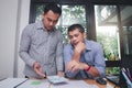 UX or UI designers designing on their smartphone application layout prototype project