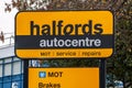 UXBRIDGE, ENGLAND- 15th November 2020: Halfords Autocentre sign in Uxbridge