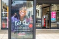 UXBRIDGE, LONDON/ENGLAND- 29 August 2020: Eat out to help out billboard in Uxbridge town centre Royalty Free Stock Photo