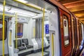 UXBRIDGE, LONDON/ENGLAND- 2 June 2020: London Underground metropolitan tube train with social distancing signage Royalty Free Stock Photo