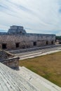 UXMAL, MEXICO - FEB 28, 2016: Tourists at the courtyard of the Nun`s Quadrangle Cuadrangulo de las Monjas building Royalty Free Stock Photo