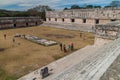 UXMAL, MEXICO - FEB 28, 2016: Tourists at the courtyard of the Nun`s Quadrangle Cuadrangulo de las Monjas building Royalty Free Stock Photo