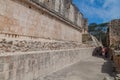 UXMAL, MEXICO - FEB 28, 2016: Tourists at the Nun`s Quadrangle Cuadrangulo de las Monjas building complex at the ruins Royalty Free Stock Photo