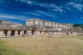 UXMAL, MEXICO - FEB 28, 2016: Tourists at the Nun`s Quadrangle Cuadrangulo de las Monjas building complex at the ruins Royalty Free Stock Photo