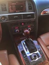 Uxury car interior details. Dashboard and steering wheel