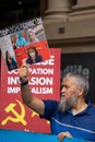 An Uyghur Australian men in a protest urging the Australian Government to concern the Uyghur Genocide