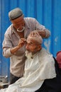 Uyghur barber Royalty Free Stock Photo